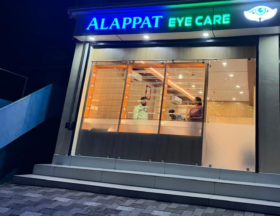 Alappat Eye Care storefront with illuminated signboard